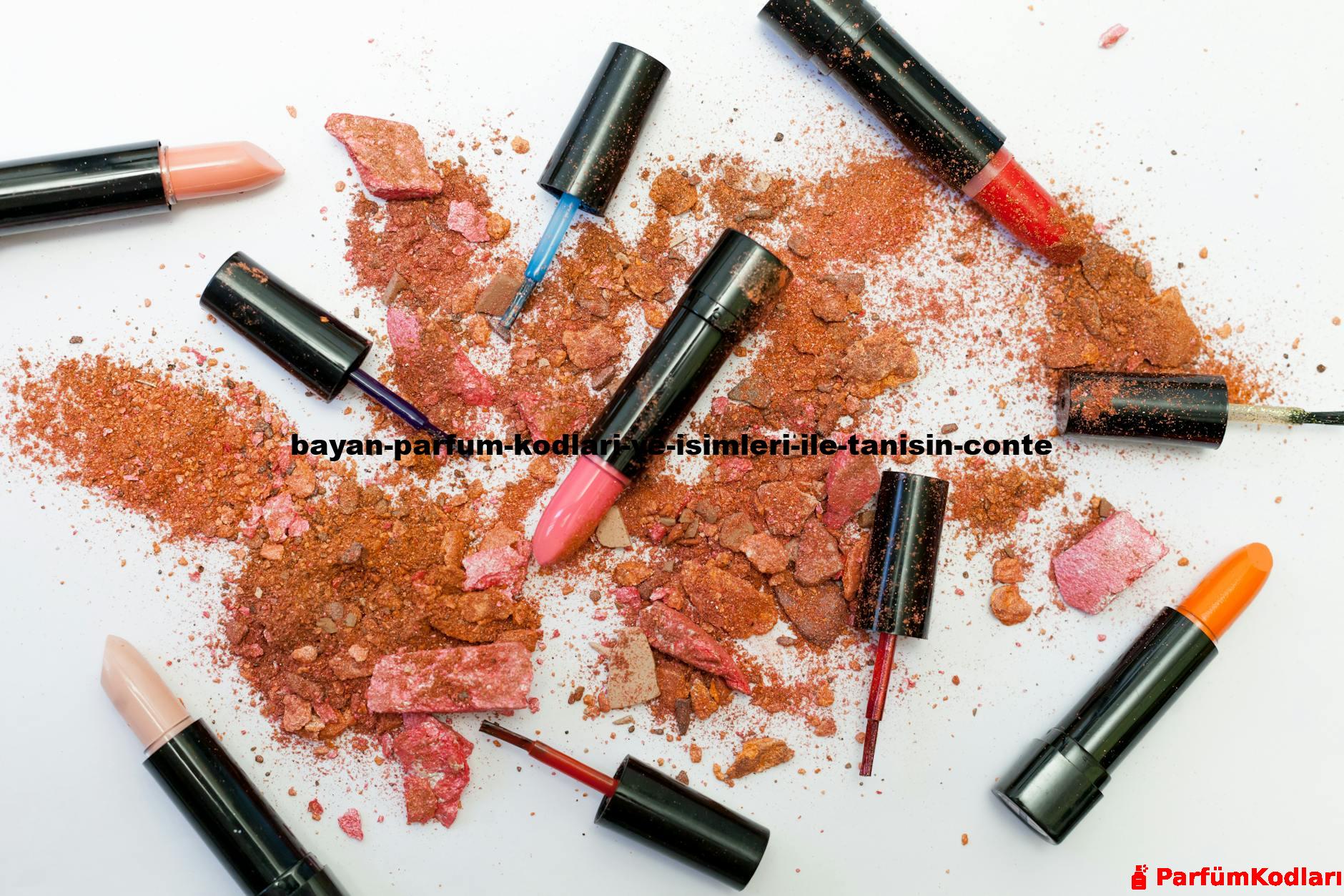 Colorful scattered makeup products including lipsticks and crushed powders on a white background.