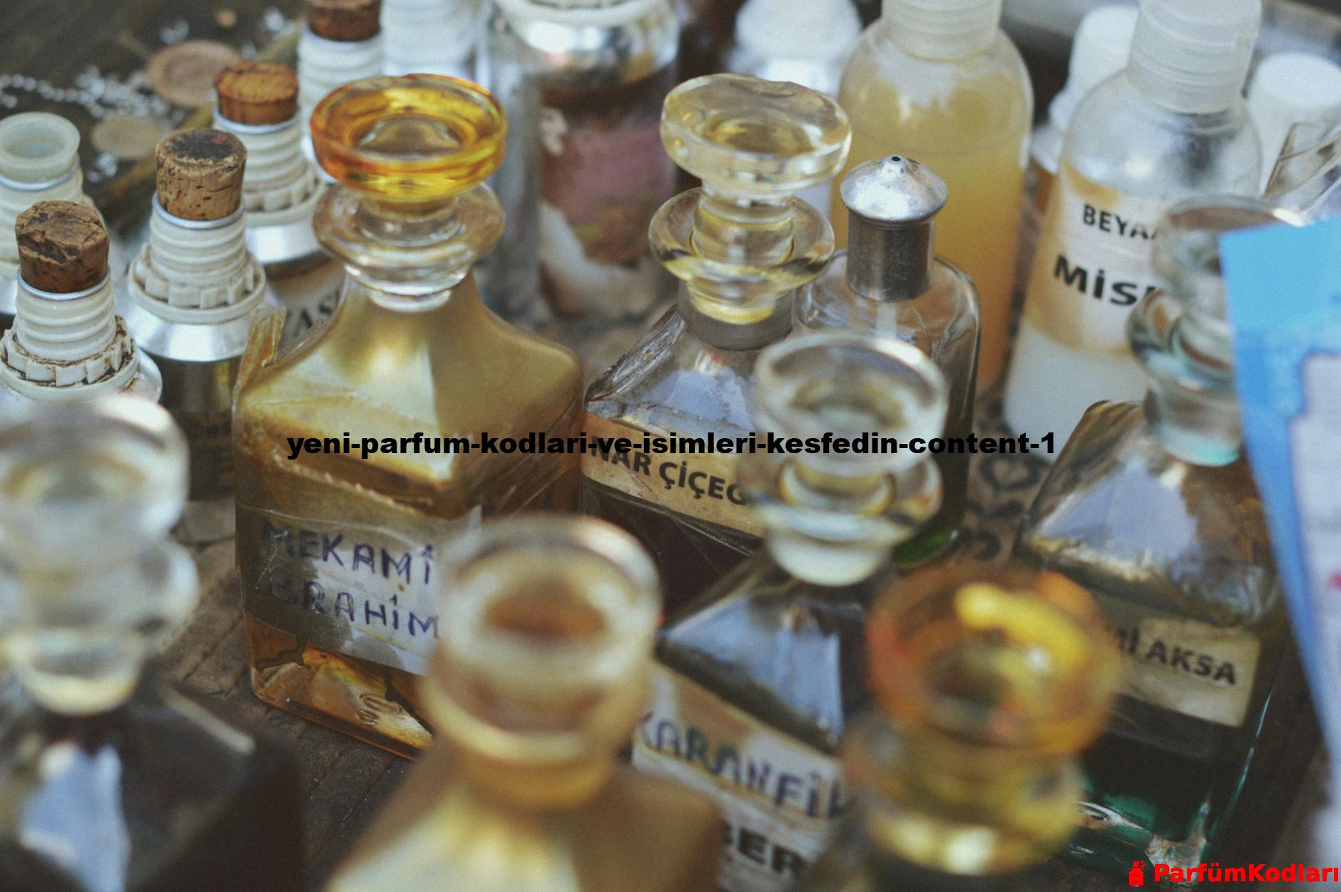 Collection of vintage glass perfume bottles with various labels in a close-up view.